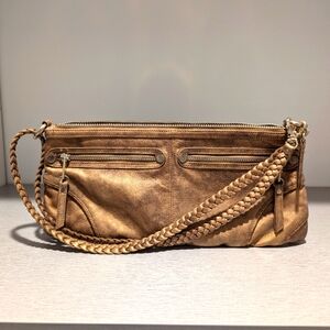 Gold-tone clutch handbag with strap